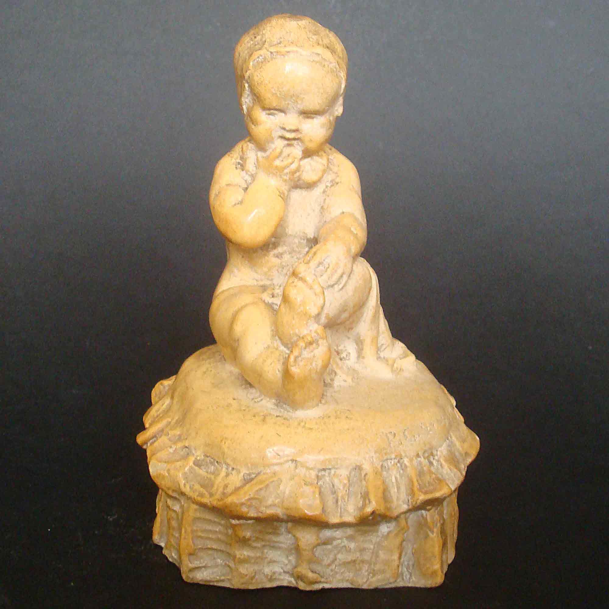 Phoebe Stabler Figure Child on Cushion